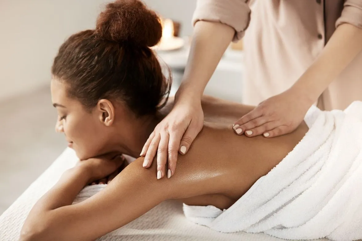 Adult relaxing during a registered massage therapy session